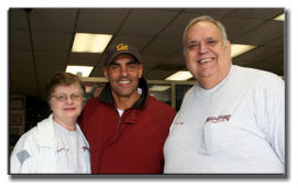The Neal's with former Chiefs Coach Herman Edwards